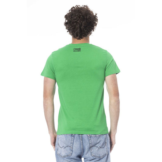 Man wearing green t-shirt and blue jeans