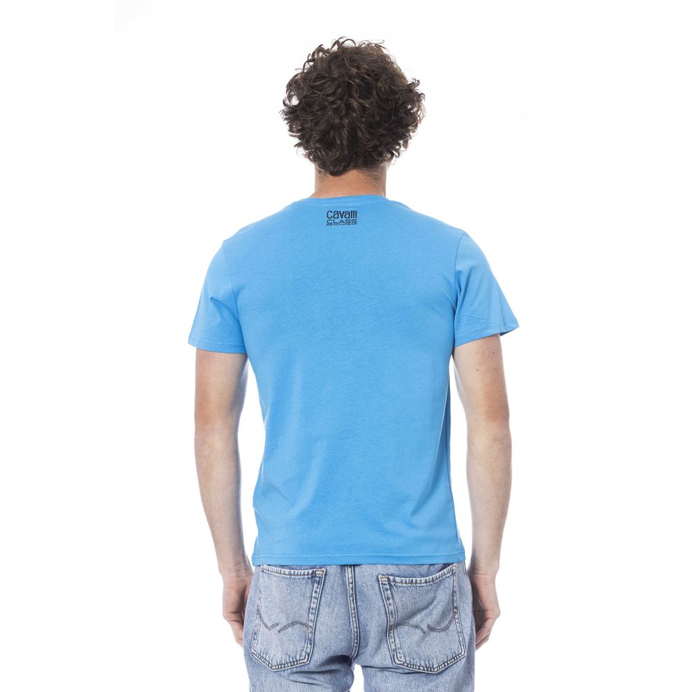 Man wearing blue t-shirt and jeans