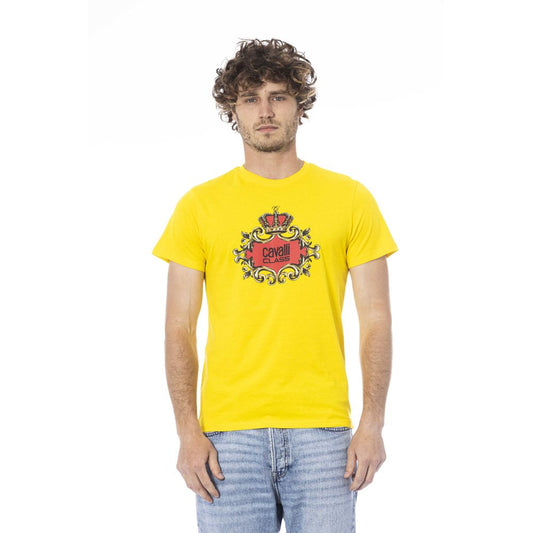 Man wearing yellow t-shirt with graphic design