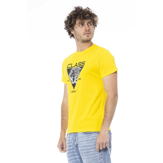 Man wearing yellow t-shirt with graphic design on front