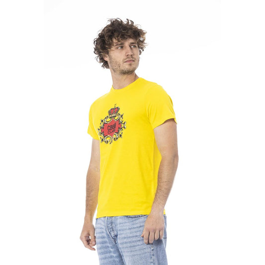 Man wearing yellow t-shirt with graphic design on front