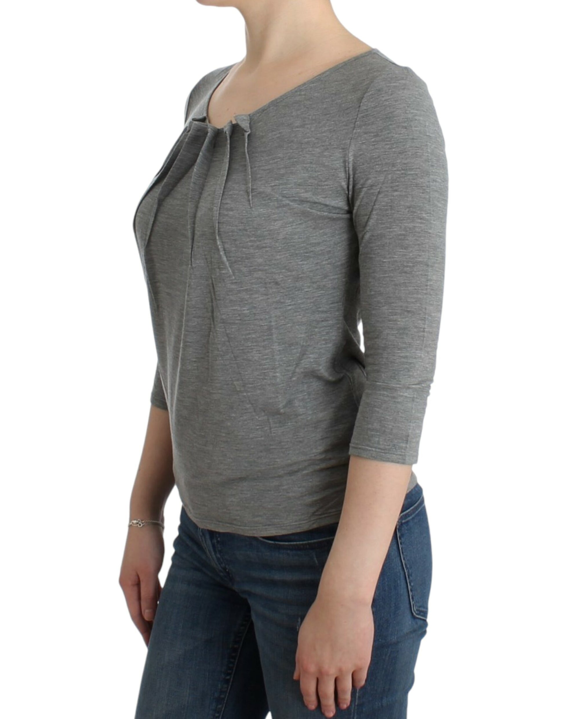 Woman wearing gray sweater