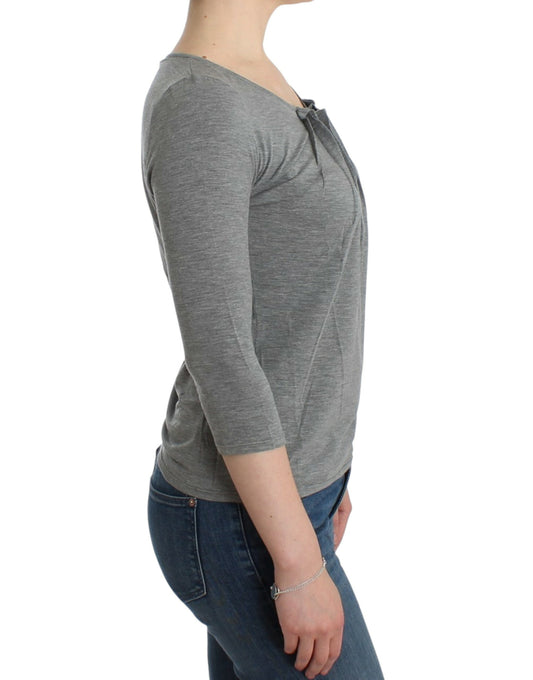 Woman wearing long sleeve shirt and jeans