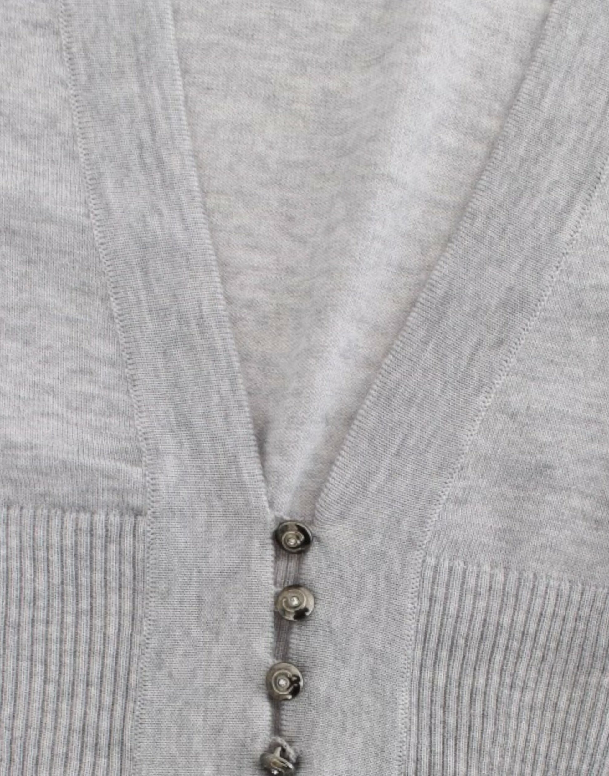 Grey sweater vest with button closure