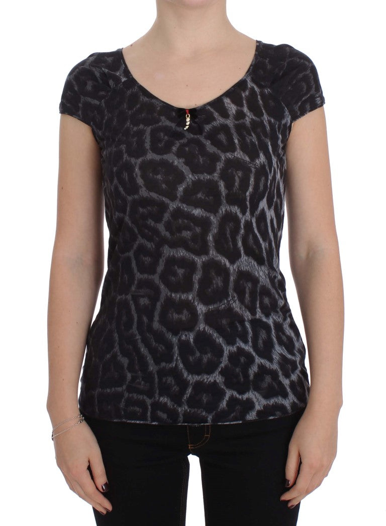 Black short sleeve shirt with animal print pattern