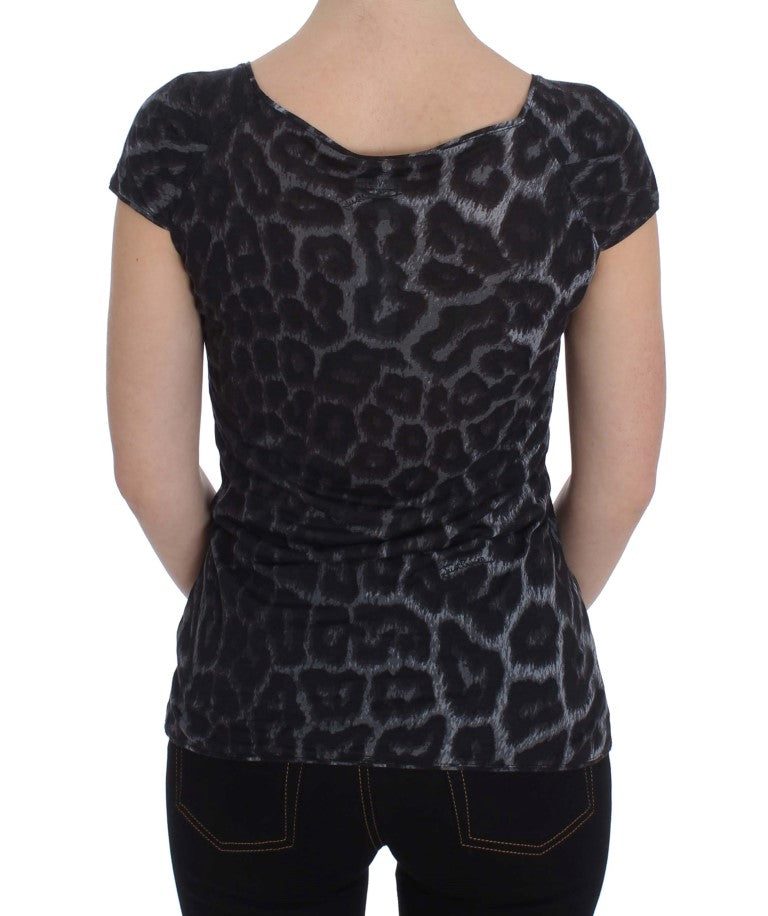 Black leopard print top on woman's back