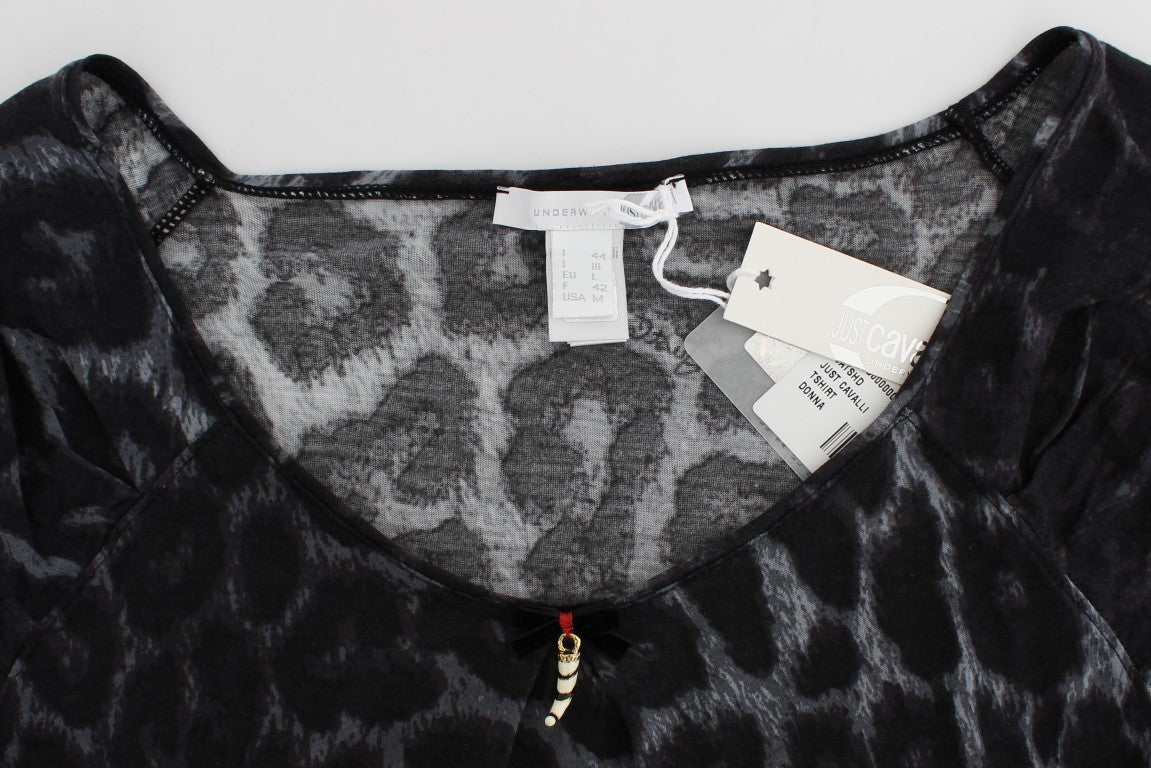 Black garment with animal print pattern on front