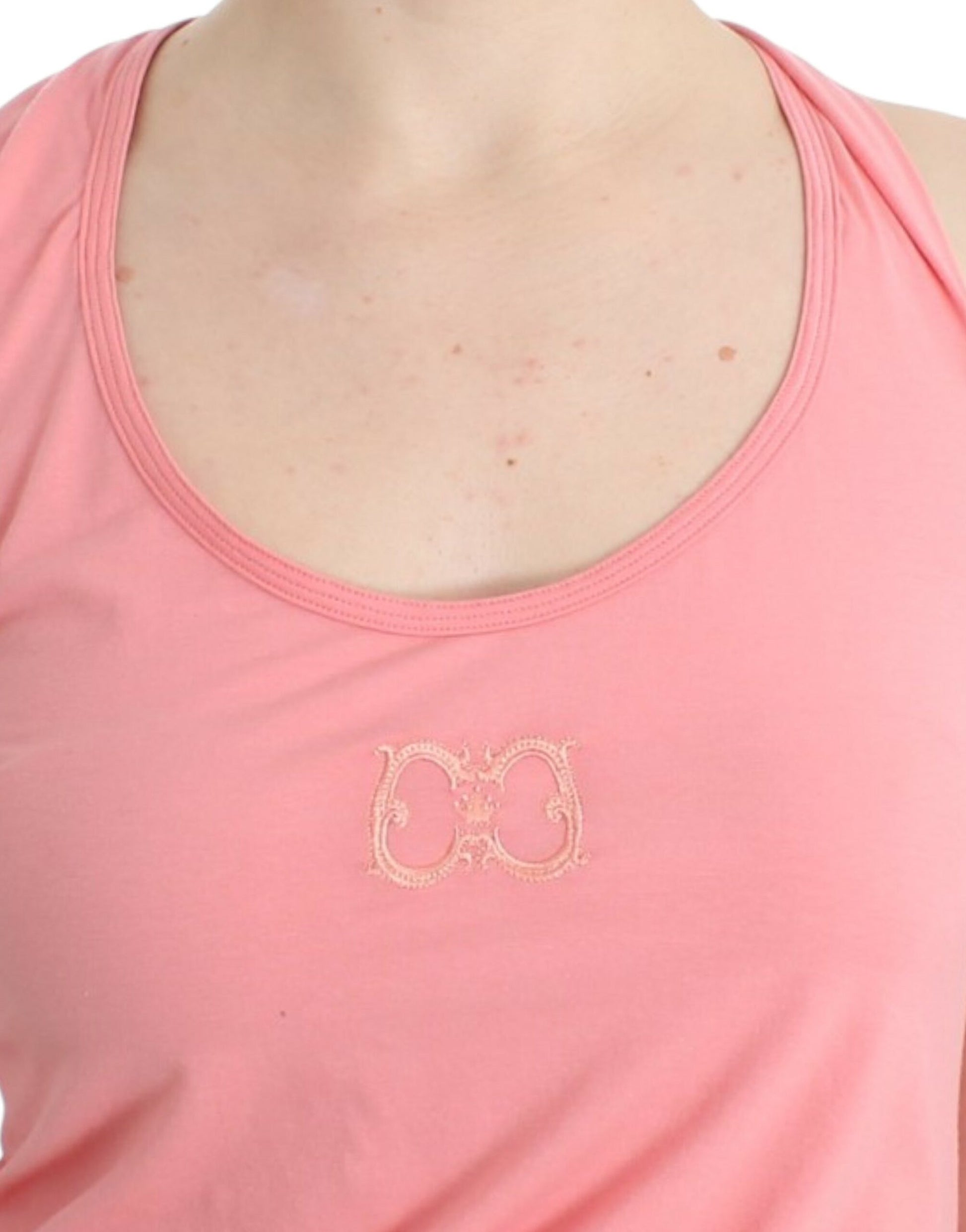 Pink tank top with embroidered butterfly on front