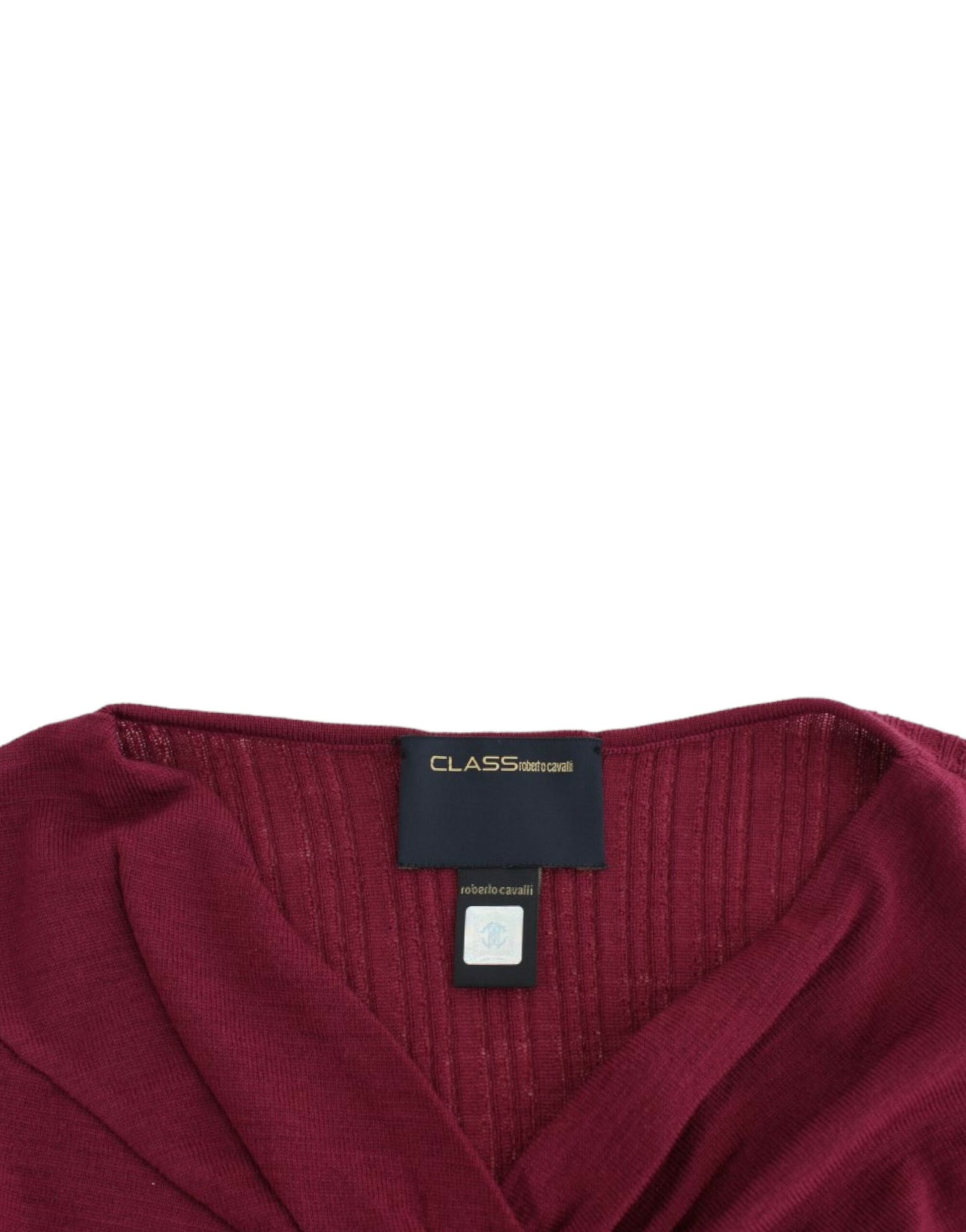 Red sweater with tag on neckline