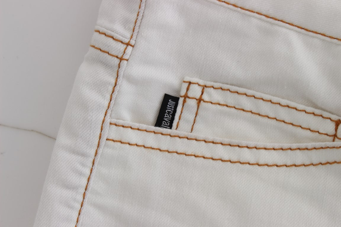 Pair of light wash jeans with black label on waistband