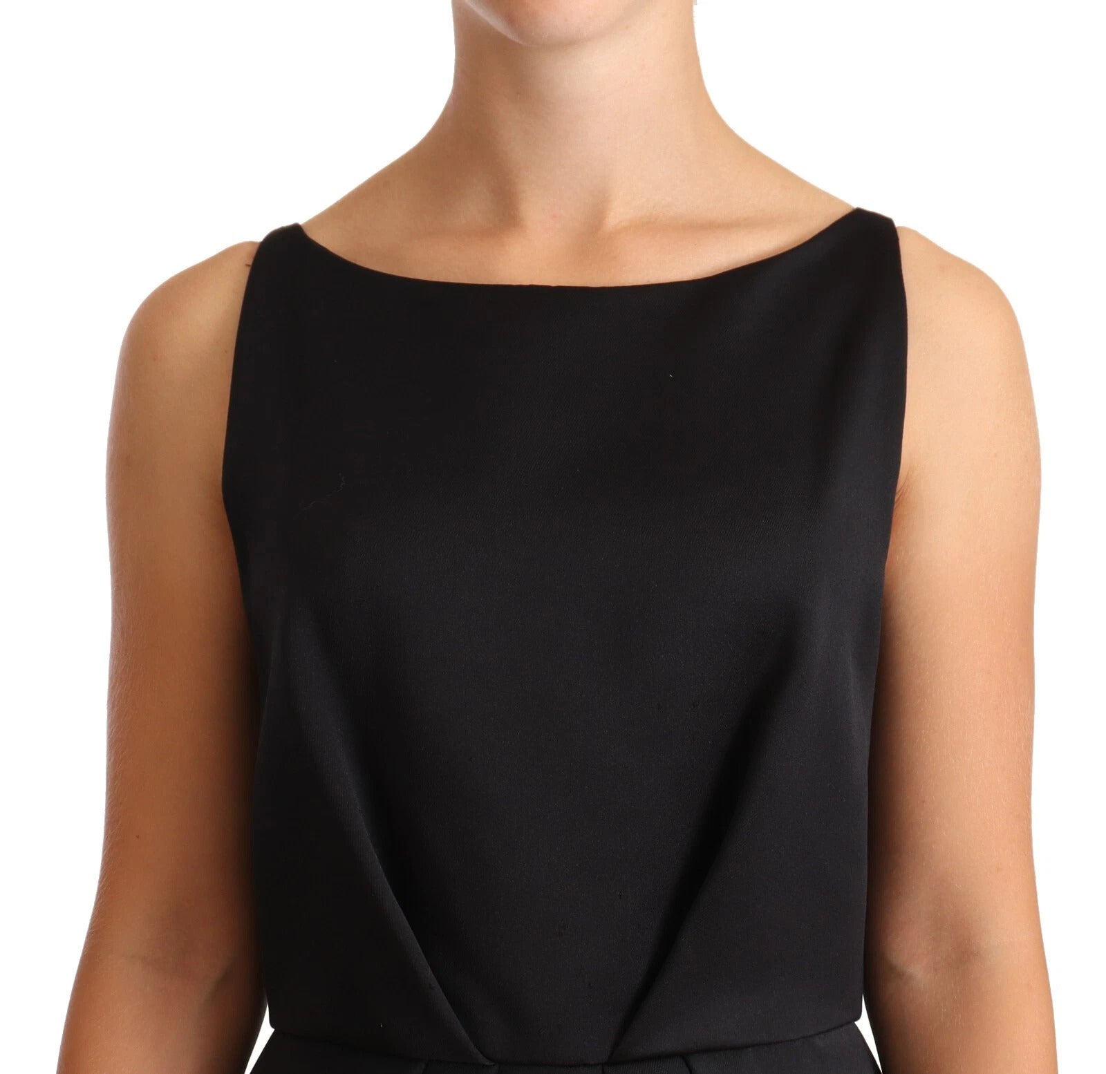 A black sleeveless pleated aline knee length dress