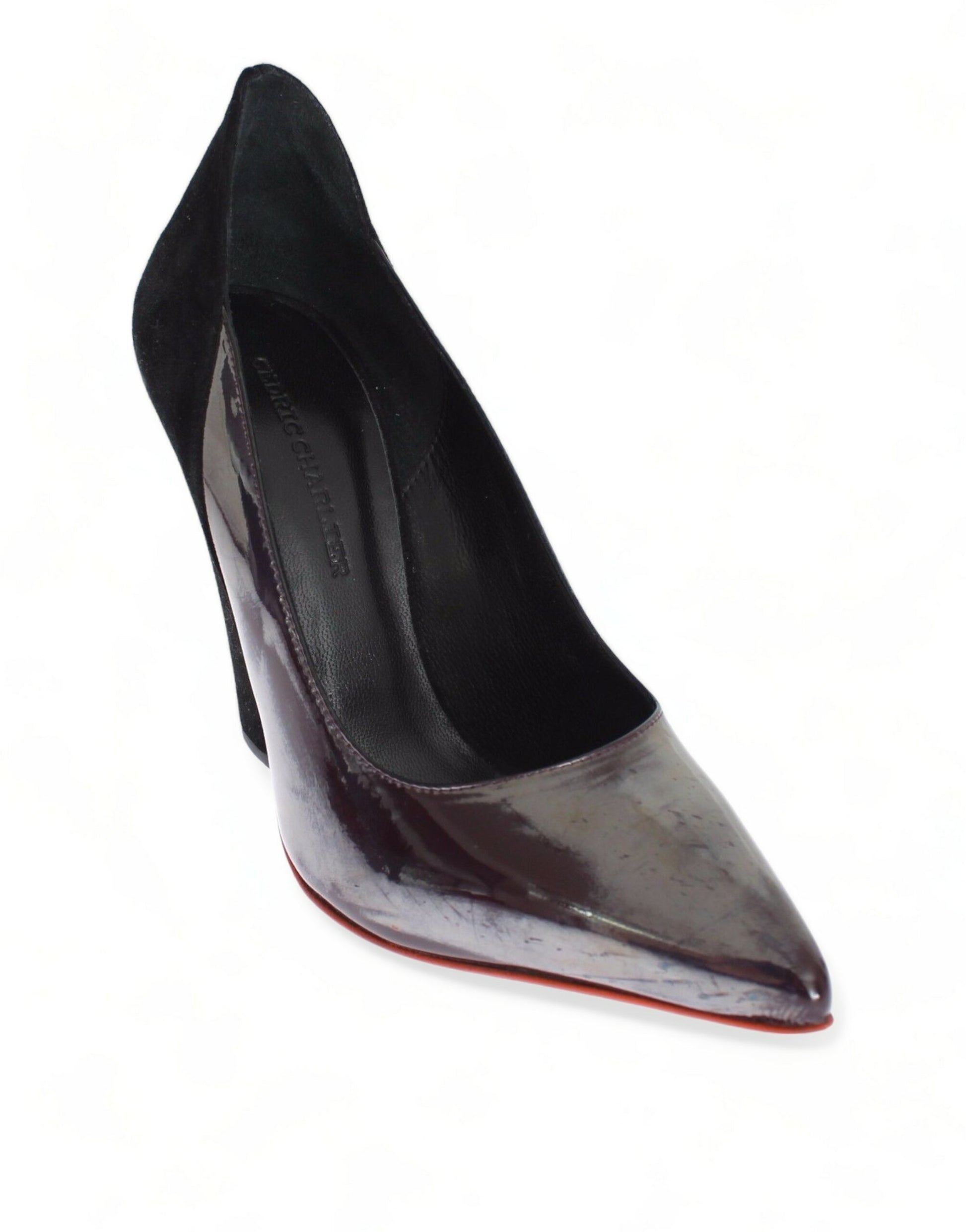 Black high heel shoe with red sole