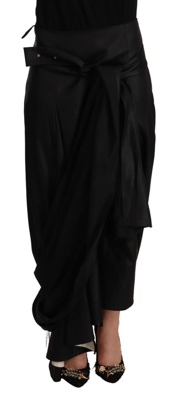 Woman wearing black pants and shoes