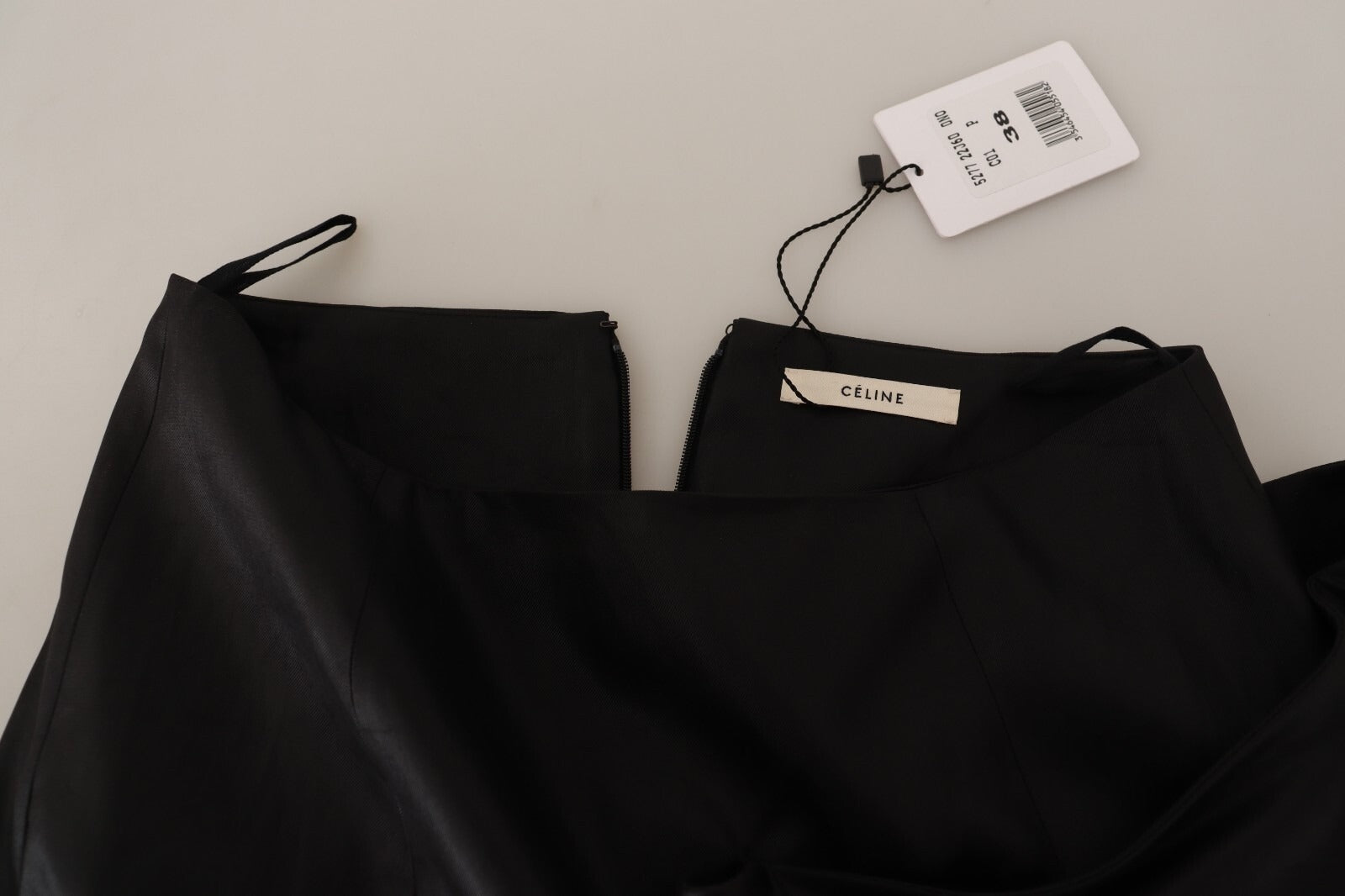 Black leather pants on hanger
