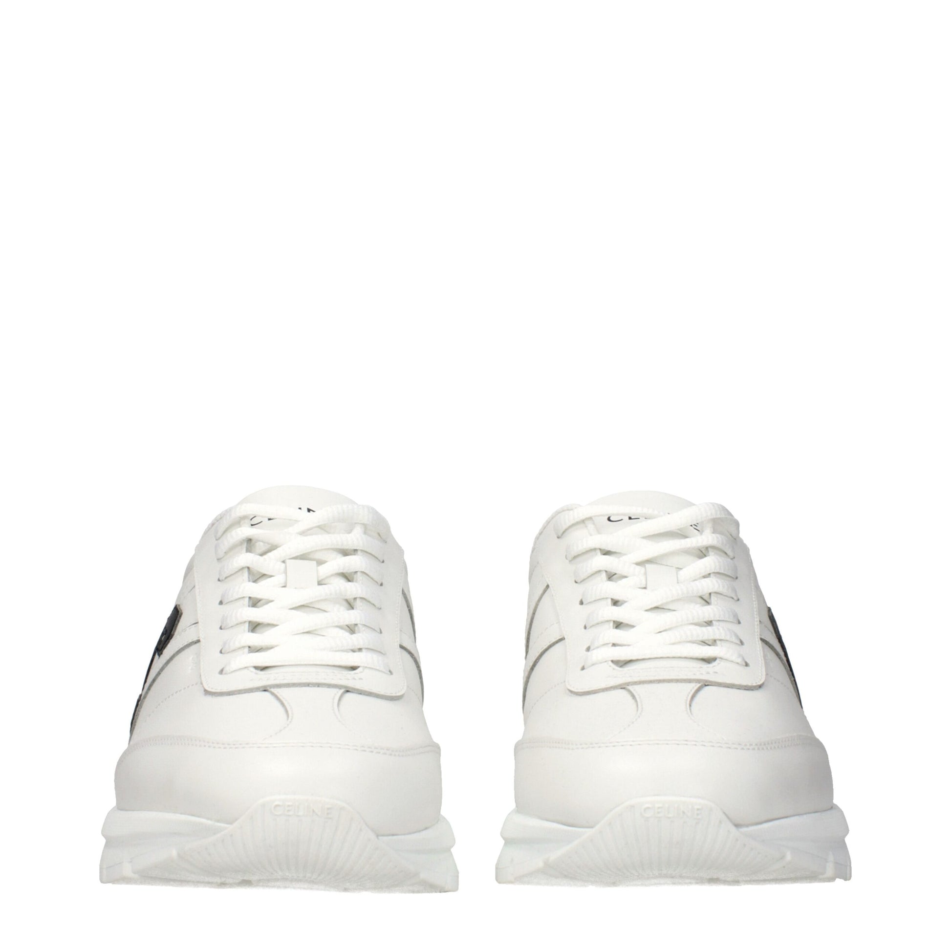Pair of white leather athletic sneakers with laces, featuring a low-top design and a flat sole