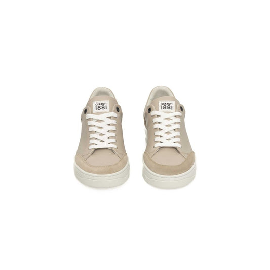Pair of beige sneakers with white laces and a white sole