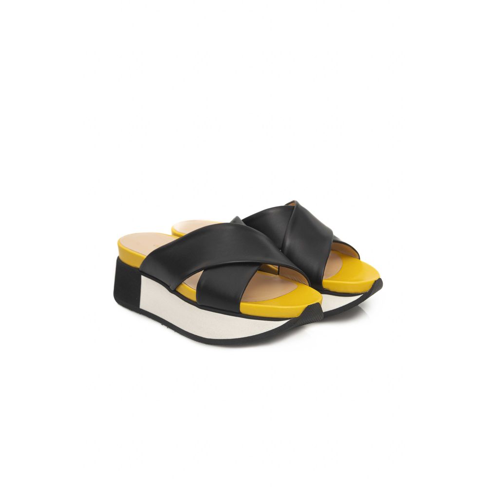 Black and yellow sandals with a strap over the foot