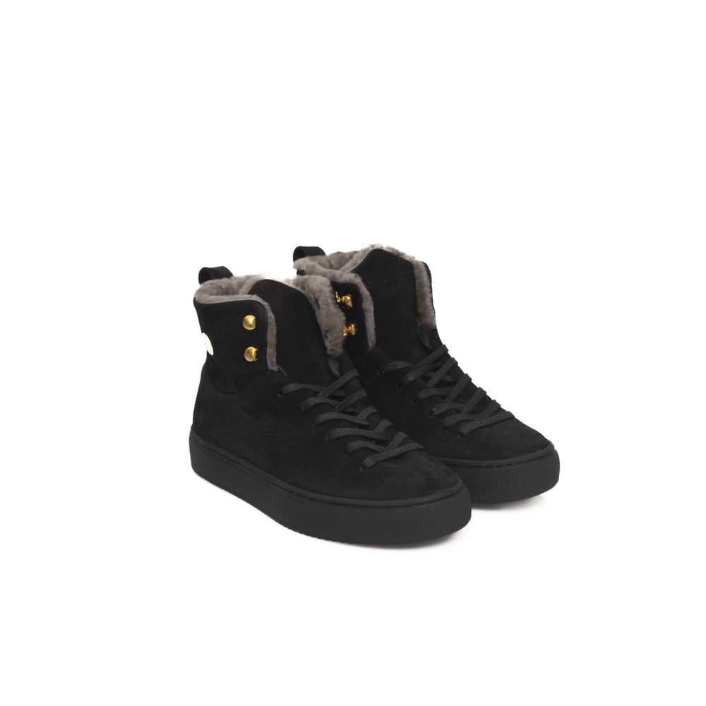 Pair of black women's sneakers with fur trim and gold accents