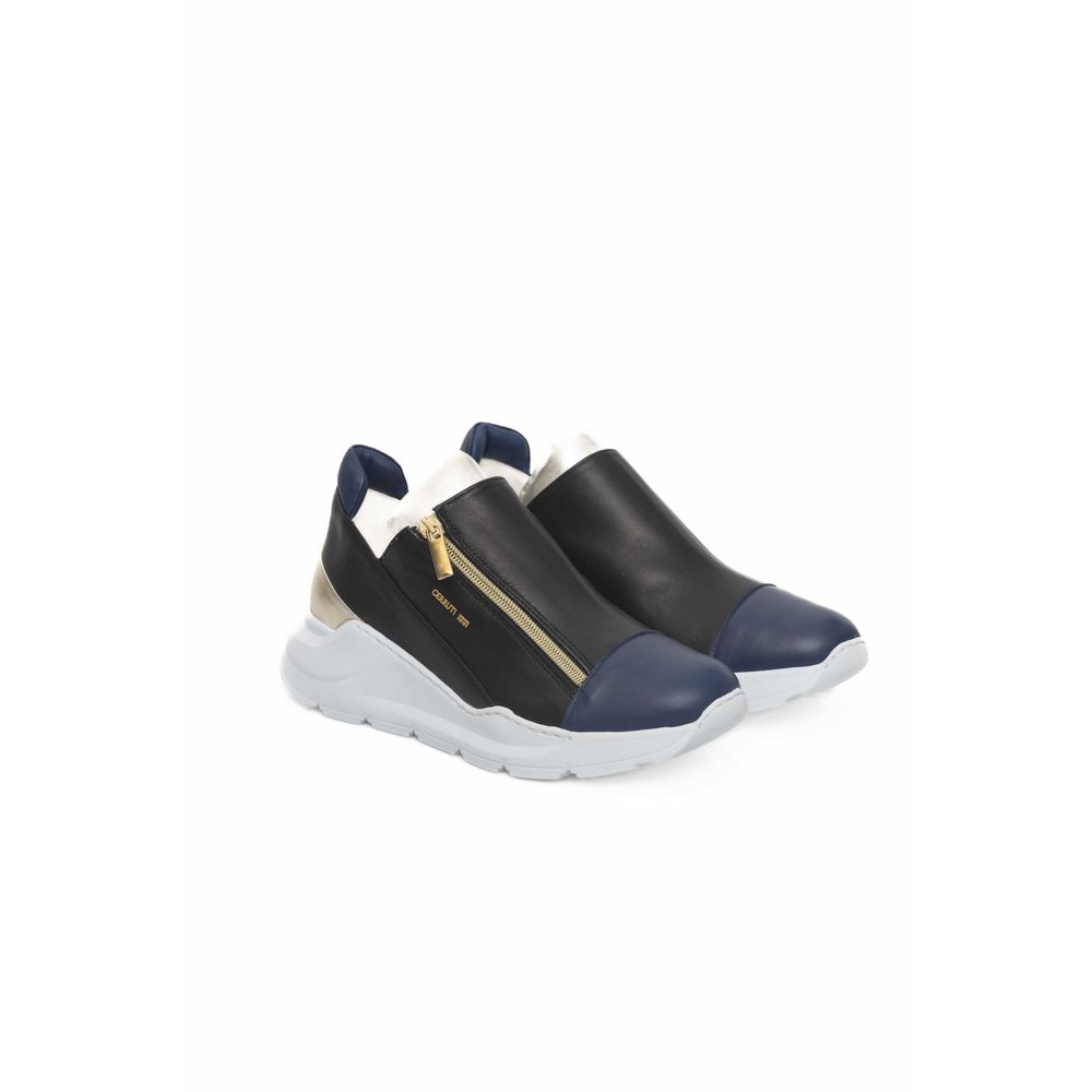 A black and white women's sneaker with a gold zipper, featuring a goatskin upper