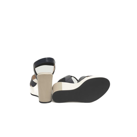 High heel shoes with black straps and tan soles