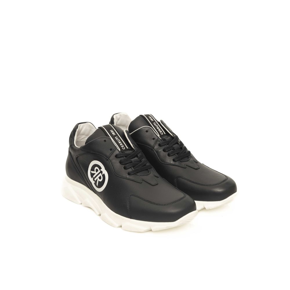 Black leather sneakers with white sole, featuring blue cow logo on side and laces
