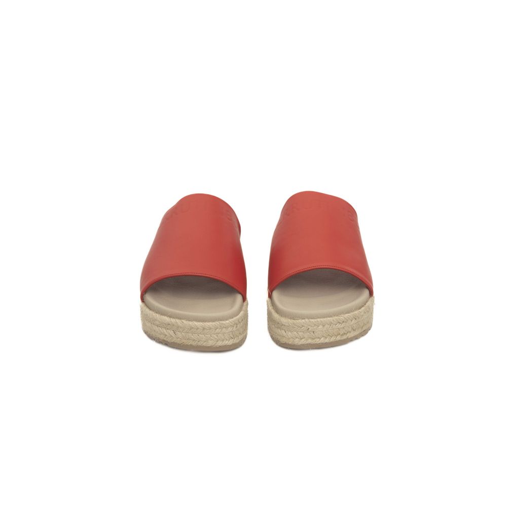 Red flip flops with tan soles