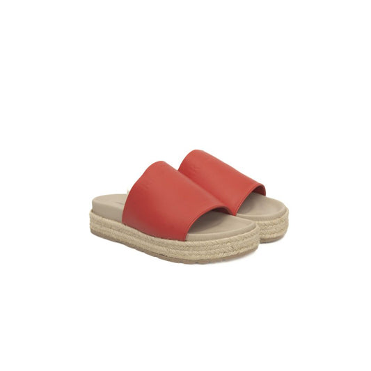 Red sandals with tan soles
