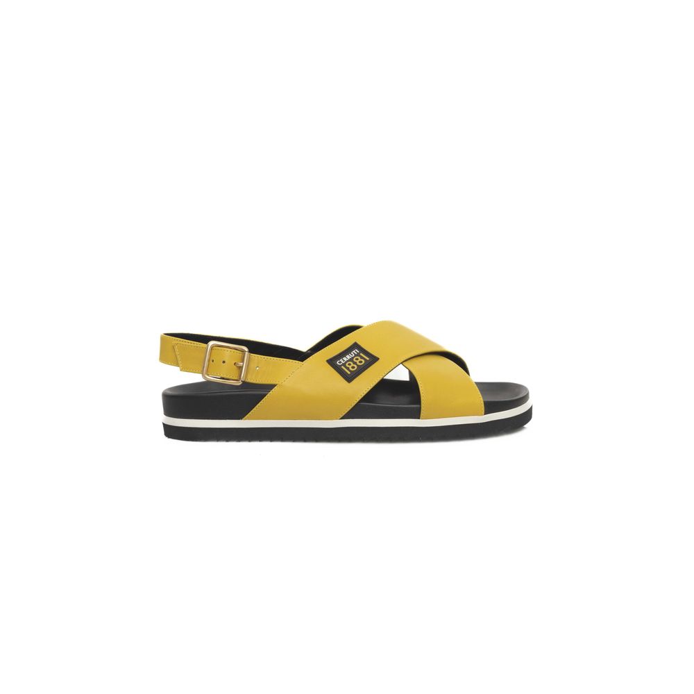 Yellow and black sandals with a strap over the foot