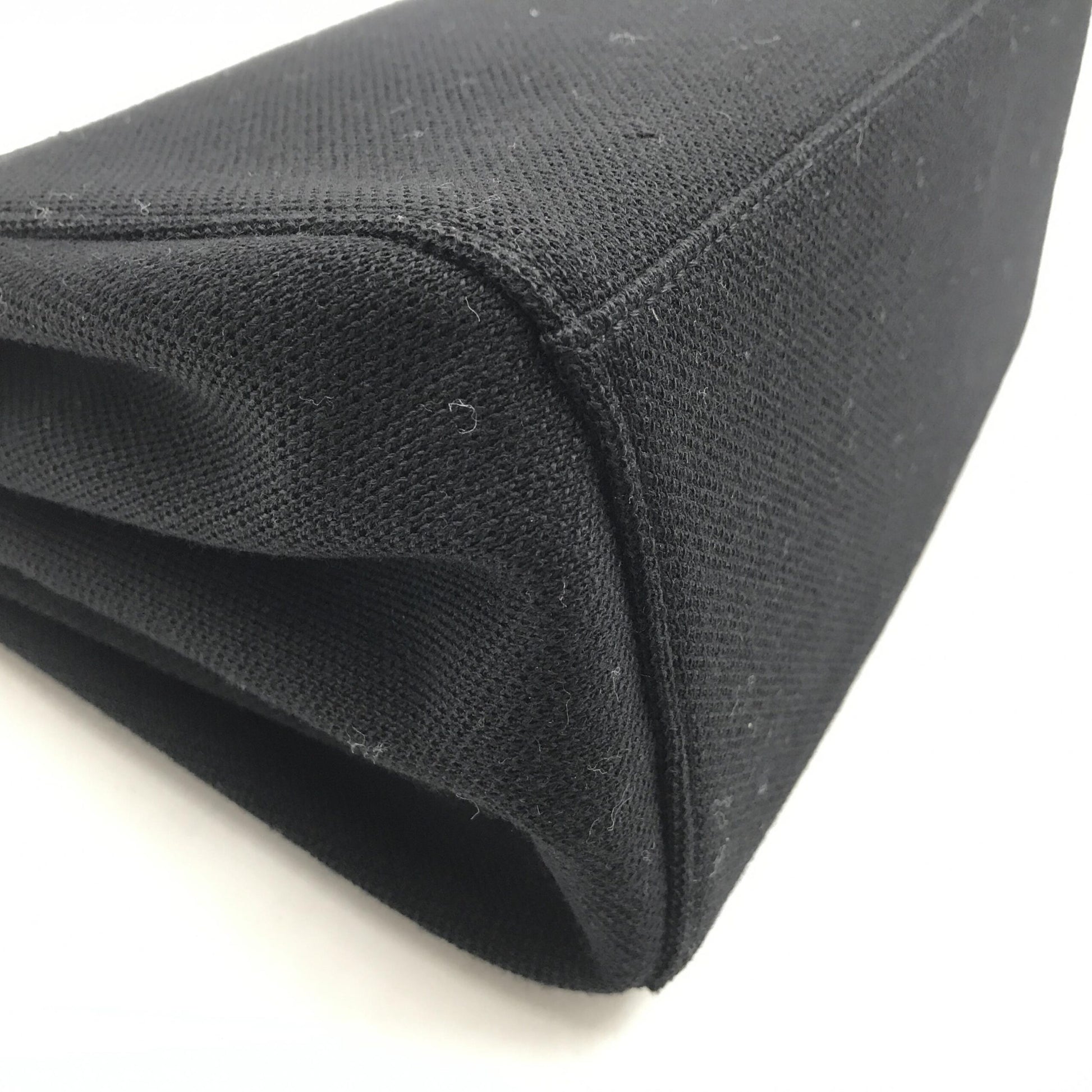 Black fabric with a curved edge