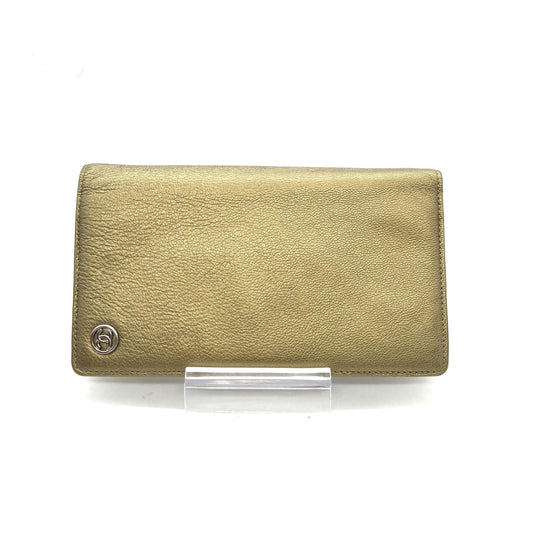 Gold leather wallet with embossed logo