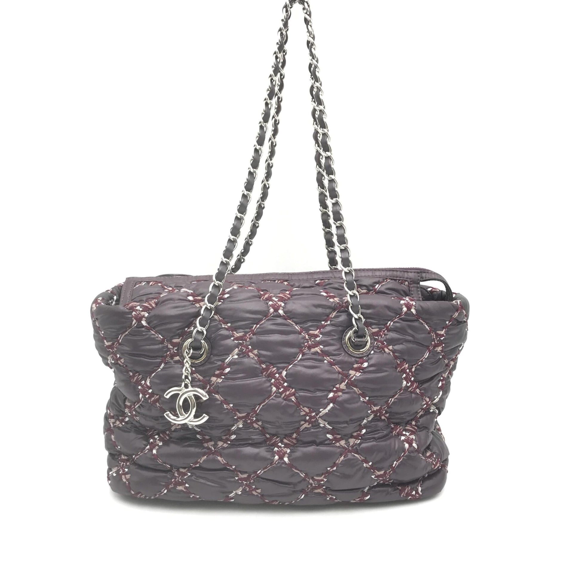 Purse with chain strap and logo on front