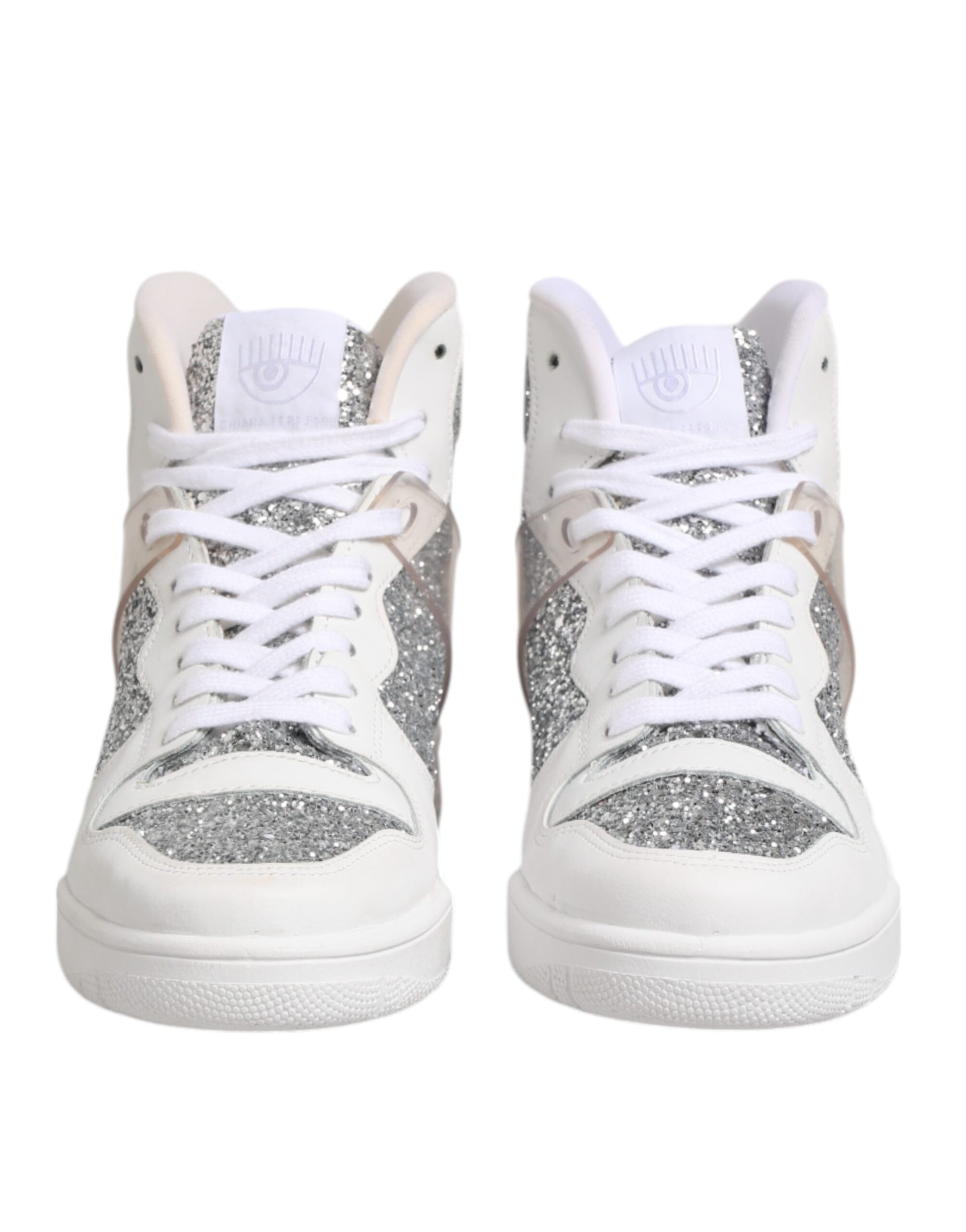 Pair of white sneakers with glittery accents