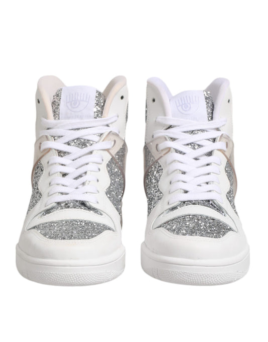 Pair of white sneakers with glittery accents