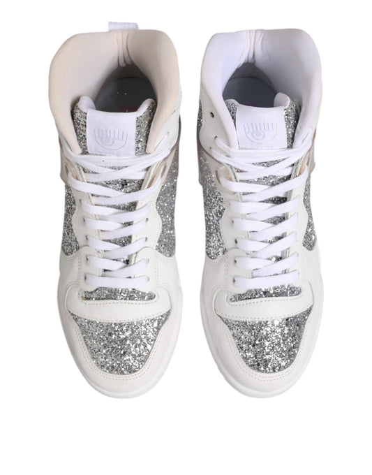 Pair of white sneakers with glittery accents