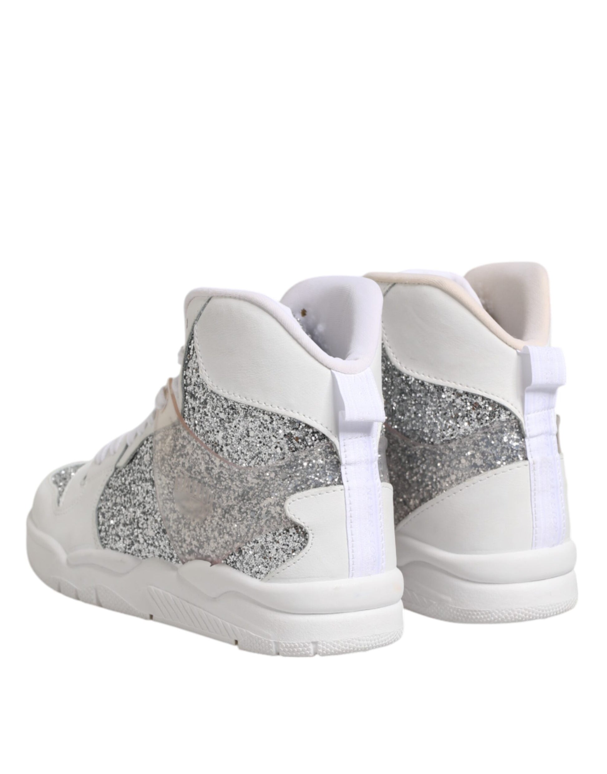 Pair of white sneakers with glittery pattern on sides