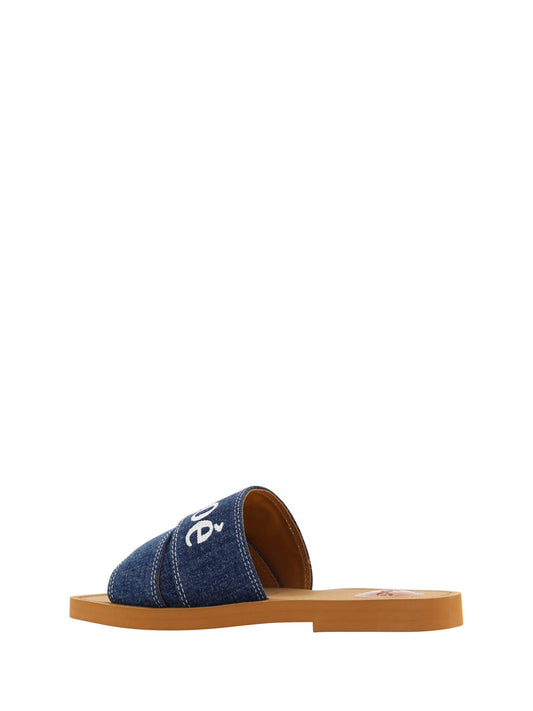 Pair of blue and white sandals with wooden soles
