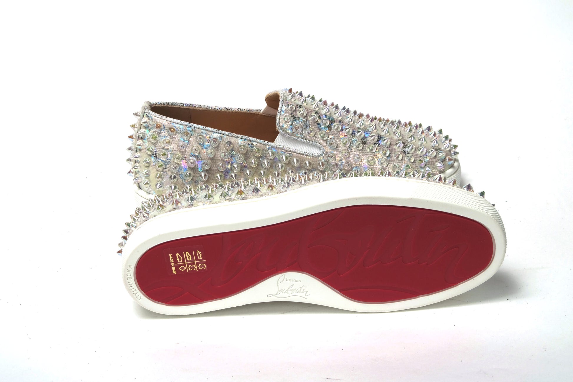 Shiny silver glittery women's shoe with red sole