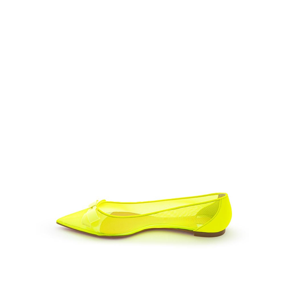 Yellow high heel shoe on white background