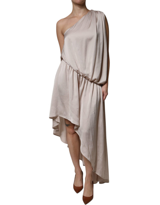 Long beige dress with ruffled sleeves and hem