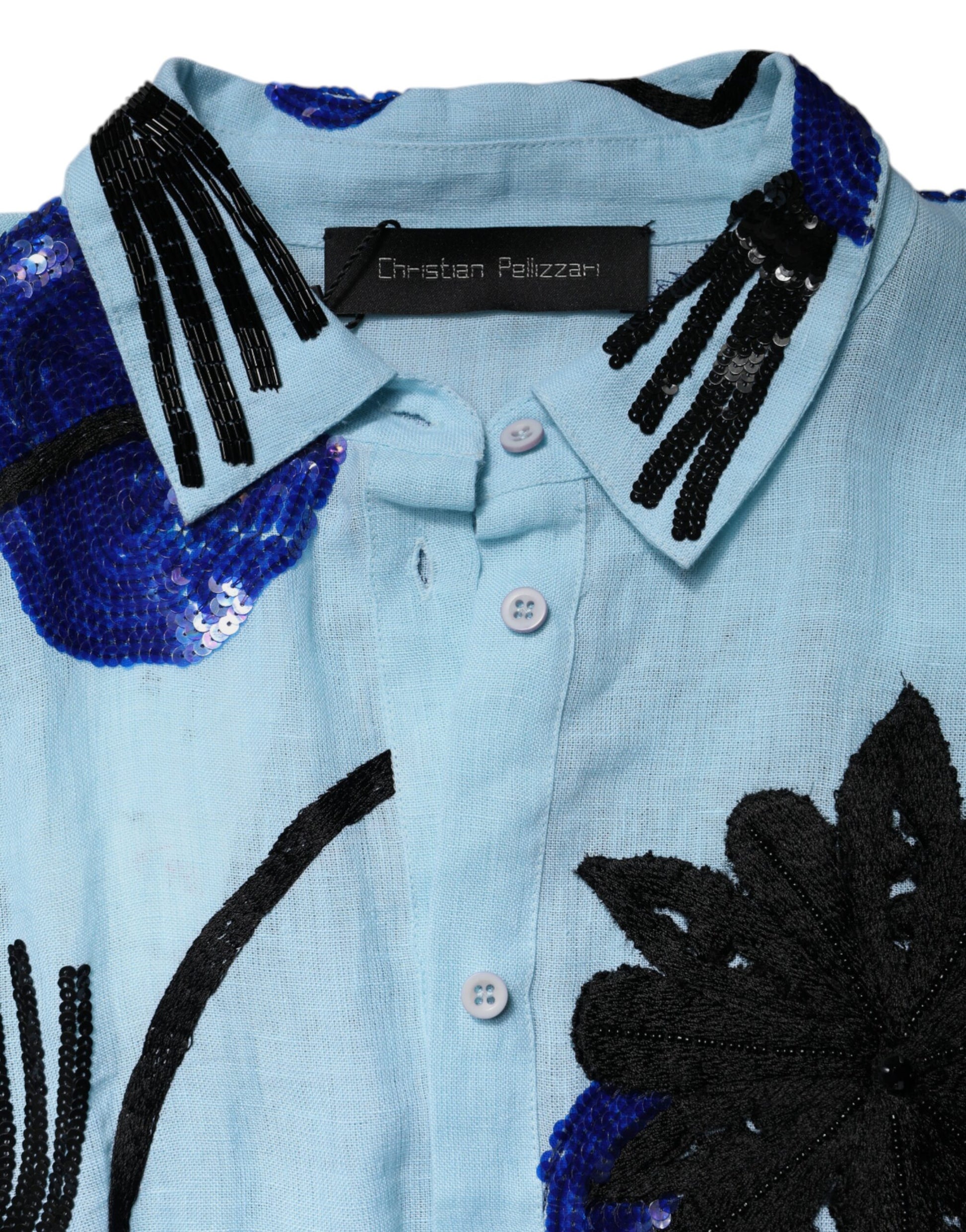 A light blue floral embellished shirt maxi dress with a high neckline and button-up front