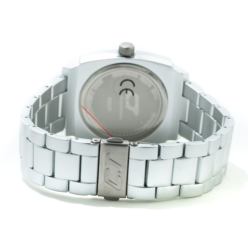 A silver aluminum watch with a black face and red second hand