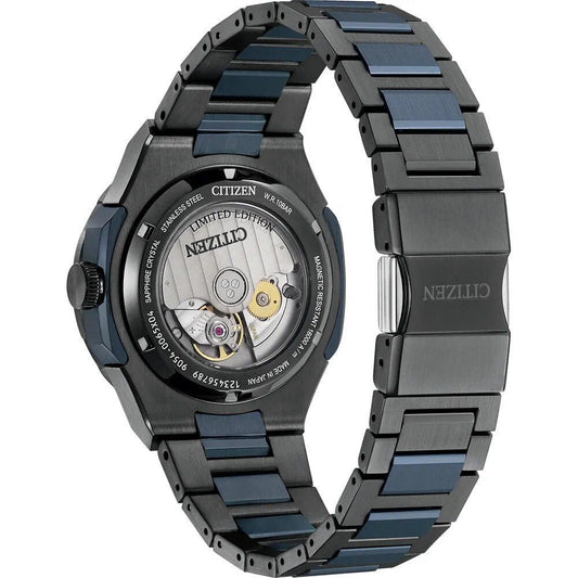 A gray stainless steel watch with a black face, featuring a chronograph function and date display