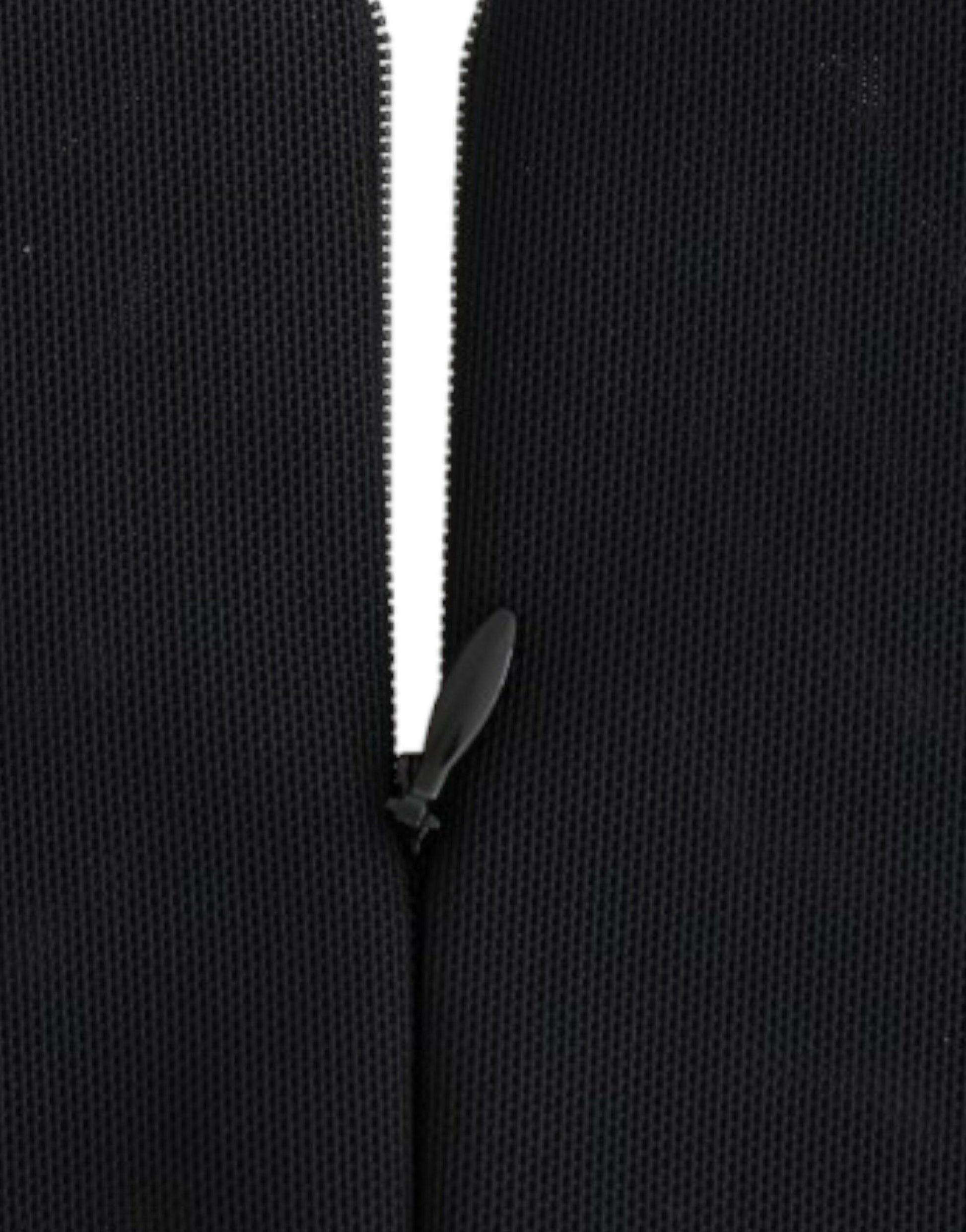 Black zippered jacket with white lining