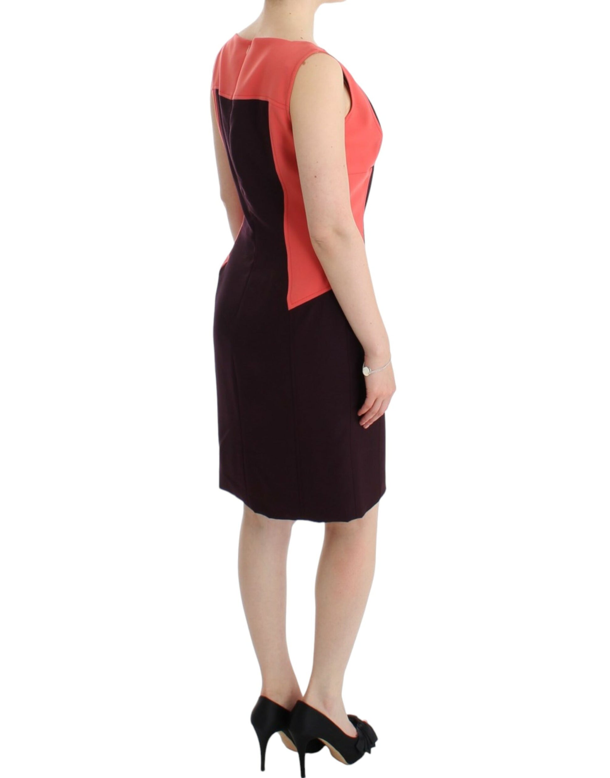Woman wearing a sleeveless dress with red accents