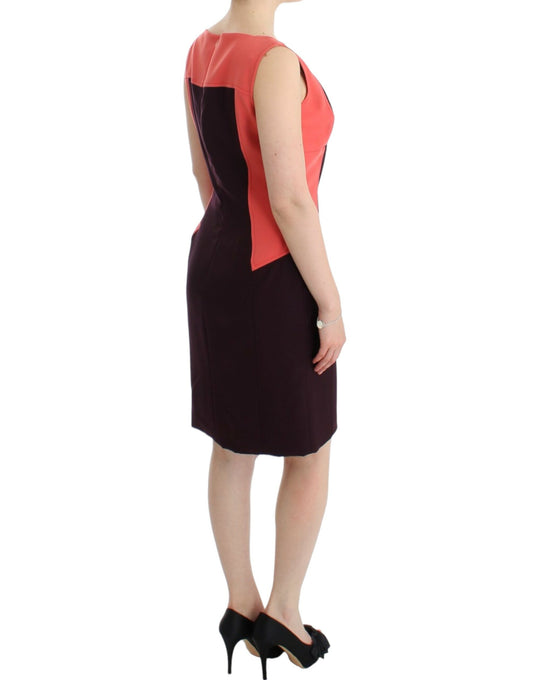 Woman wearing a sleeveless dress with red accents