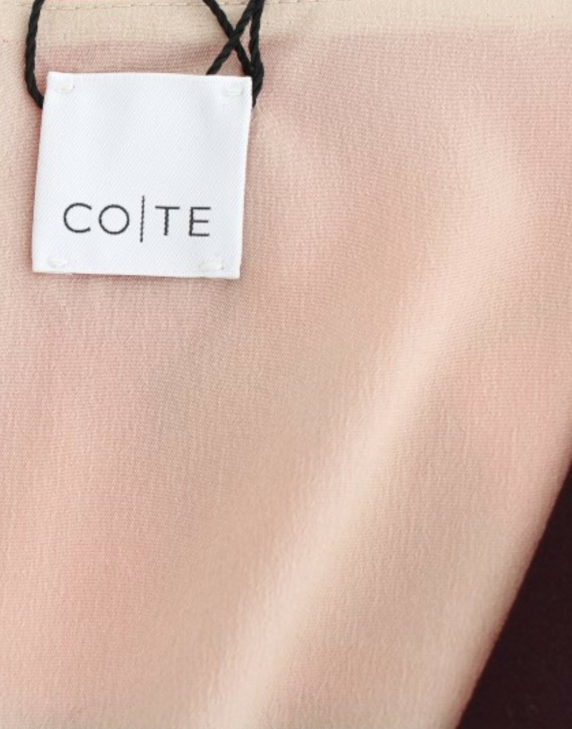 Clothing tag on fabric
