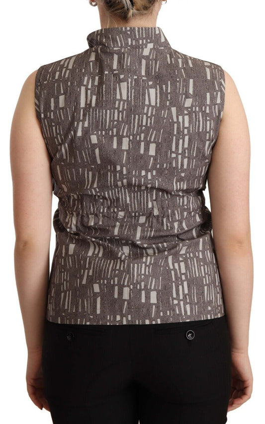 Back view of a woman wearing a sleeveless vest with a patterned design