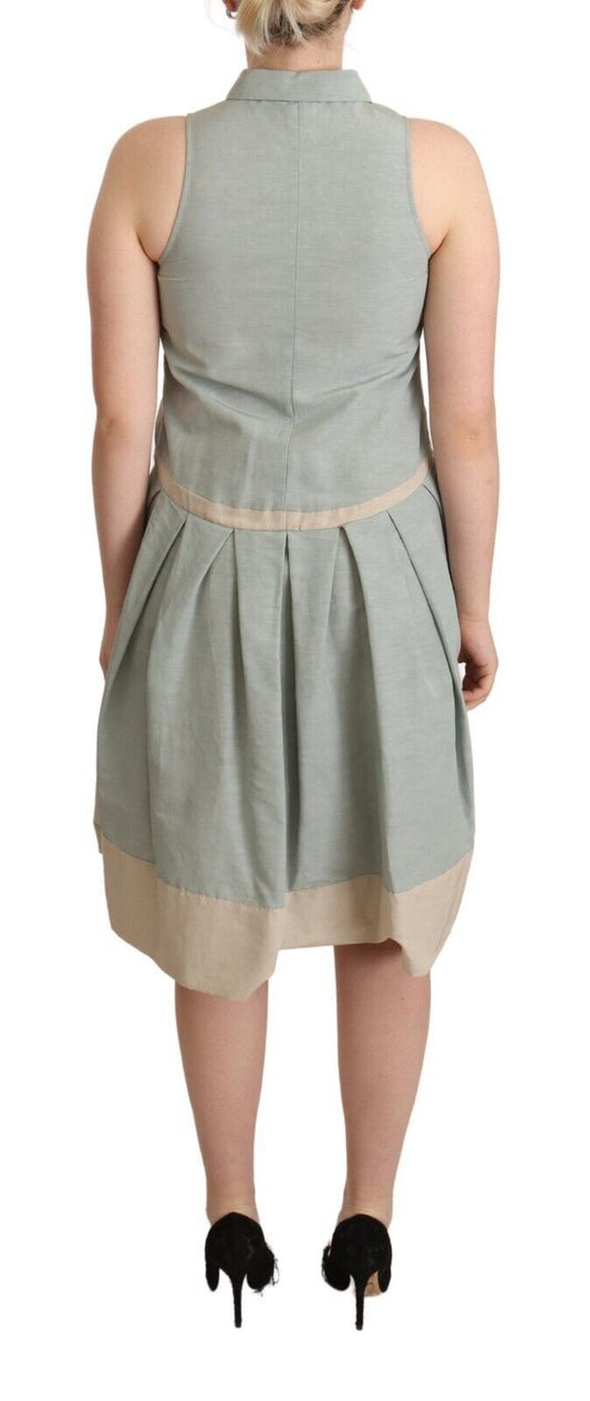 A sleeveless sheath dress with a collar and a multicolored pattern