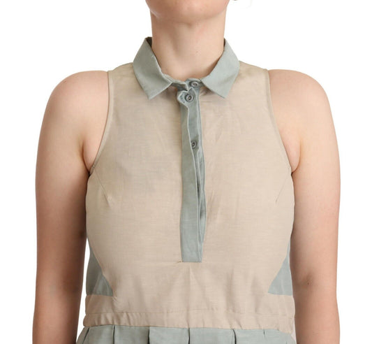 A sleeveless sheath dress with a collar and a tie at the neck
