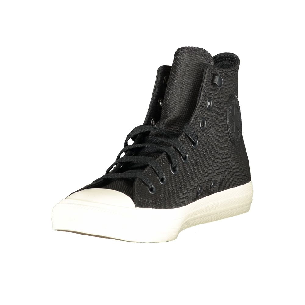 Black leather unisex sneaker with white sole, laces, and logo